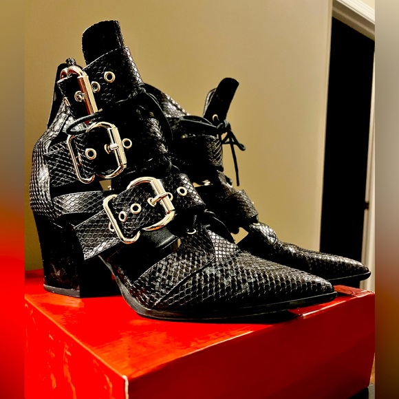 Black “witchy” edgy boot. 2” heel. Worn twice. Like new. - Picture 2 of 4